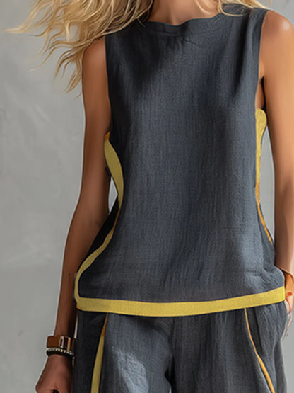 Leila - Elegante y casual conjunto de chaleco y pantalón de algodón y lino gris con ribete bicolor.