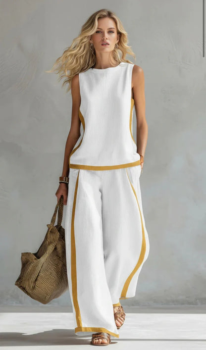Leila - Elegante y casual conjunto de chaleco y pantalón de algodón y lino gris con ribete bicolor.