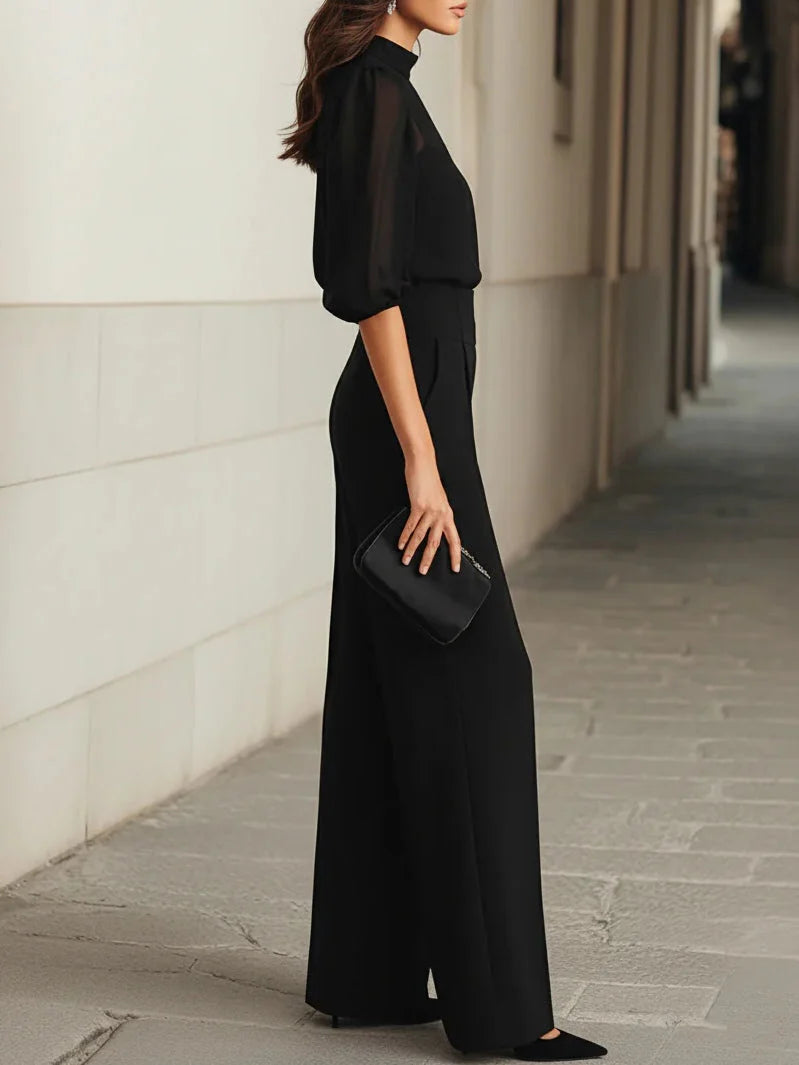 VALENTINA • CONJUNTO DE TRES PIEZAS NEGRO, COMPUESTO POR UNA CAMISOLA TRANSPARENTE Y PANTALONES DE PIERNA ANCHA